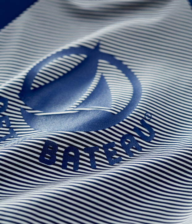 Tuta anti-UV beb&egrave; in materiale ecoresponsabile blu/bianco