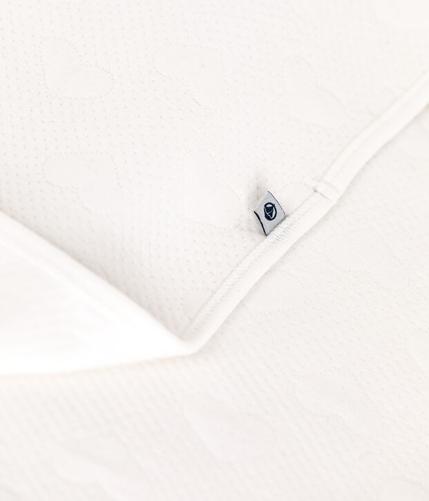Coperta in tubique neonato bianco