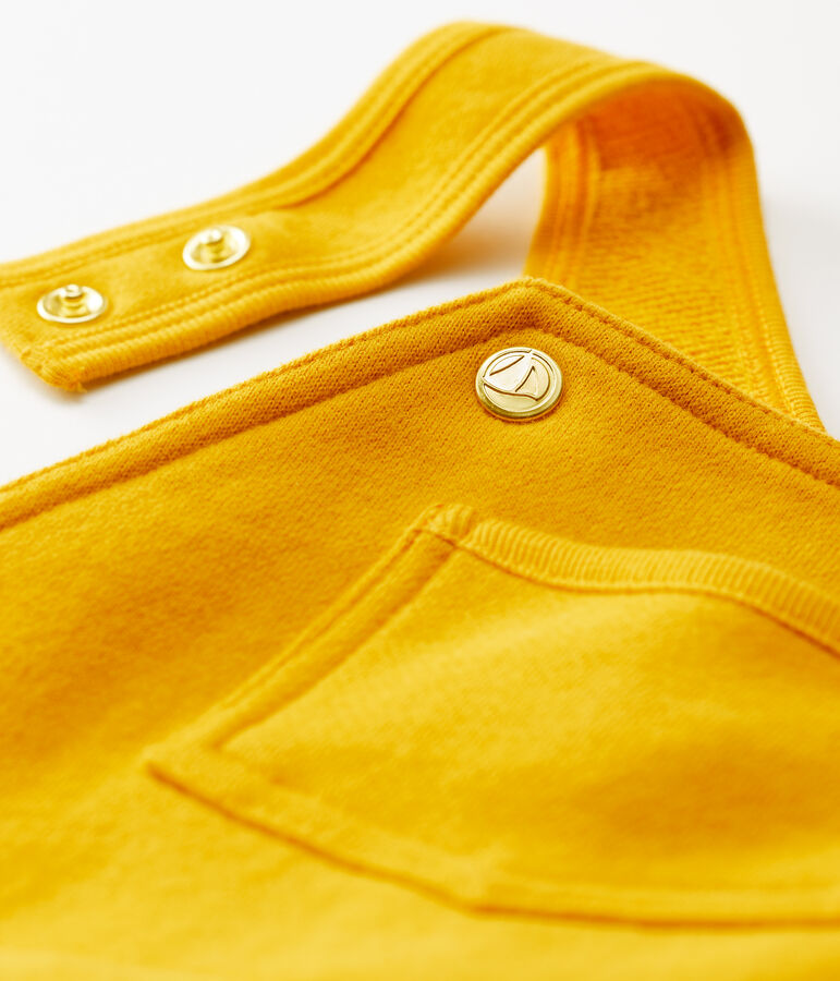 Salopette in felpa beb&egrave;. giallo