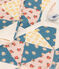Pigiama bebè senza piedi patchwork in cotone bianco AVALANCHE/ MULTICO