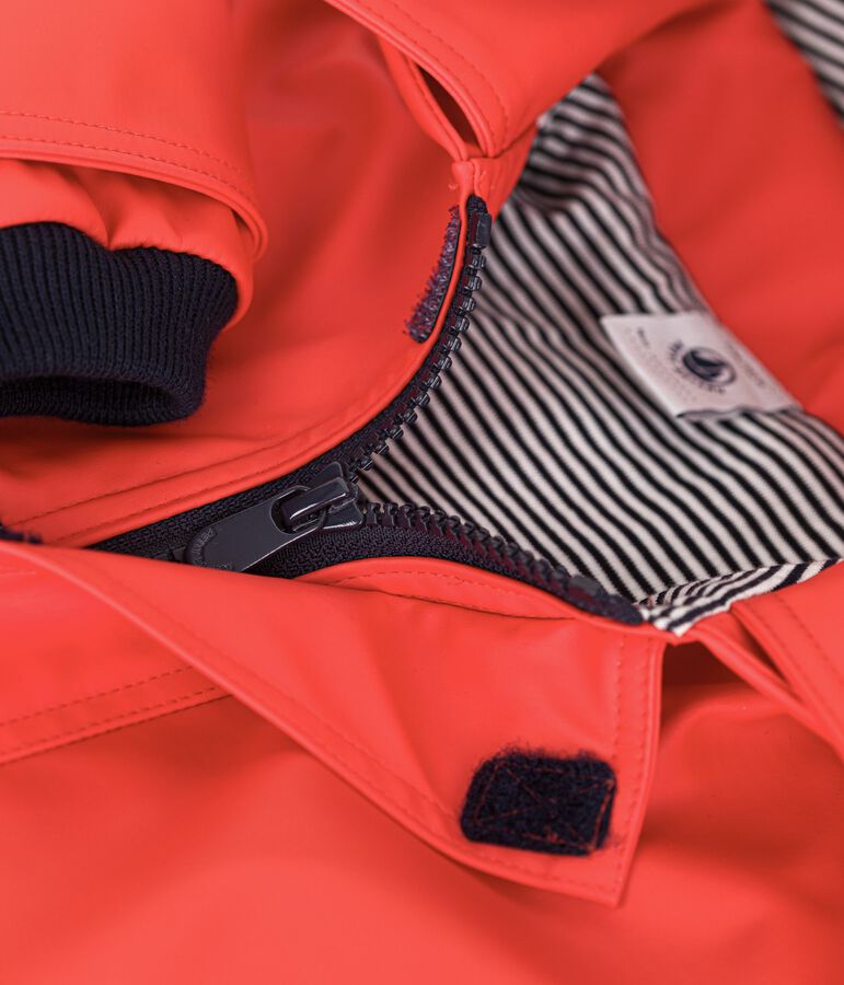 Iconica cerata per neonato in materiale idrorepallente rosso