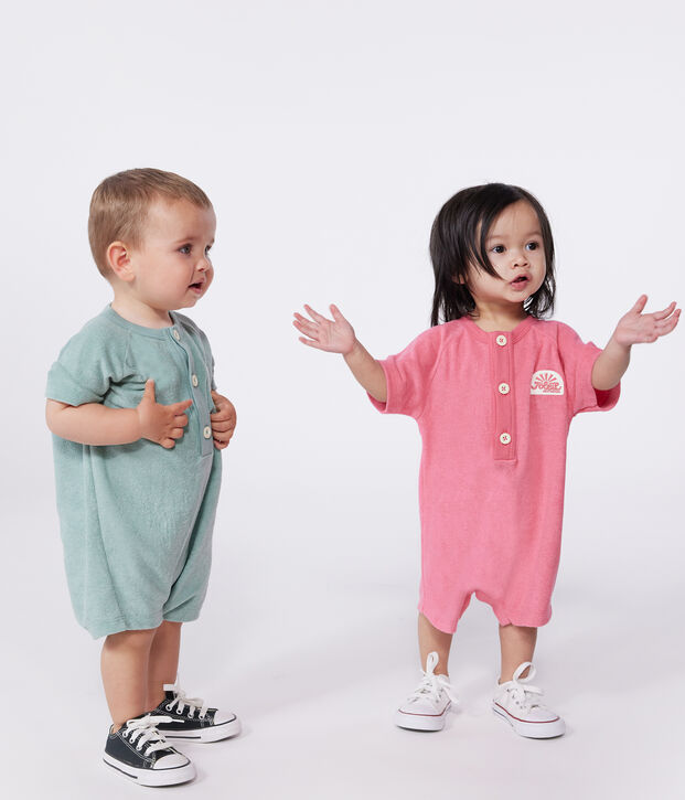 Tutina corta a maniche corte in spugna di cotone tinta unita con stemma neonato rosa