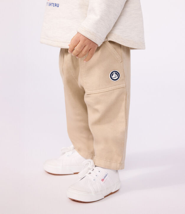 Pantaloni stile cargo in cotone tinta unita con stemma neonato beige
